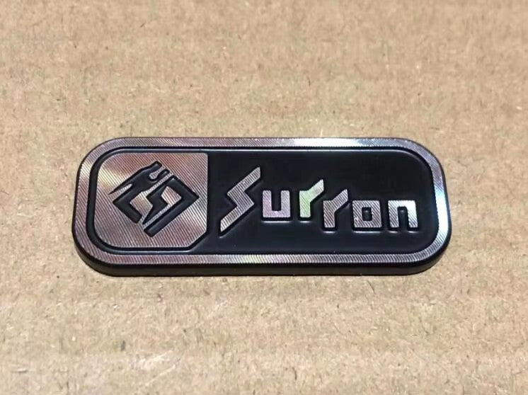 Surron Logo Badge